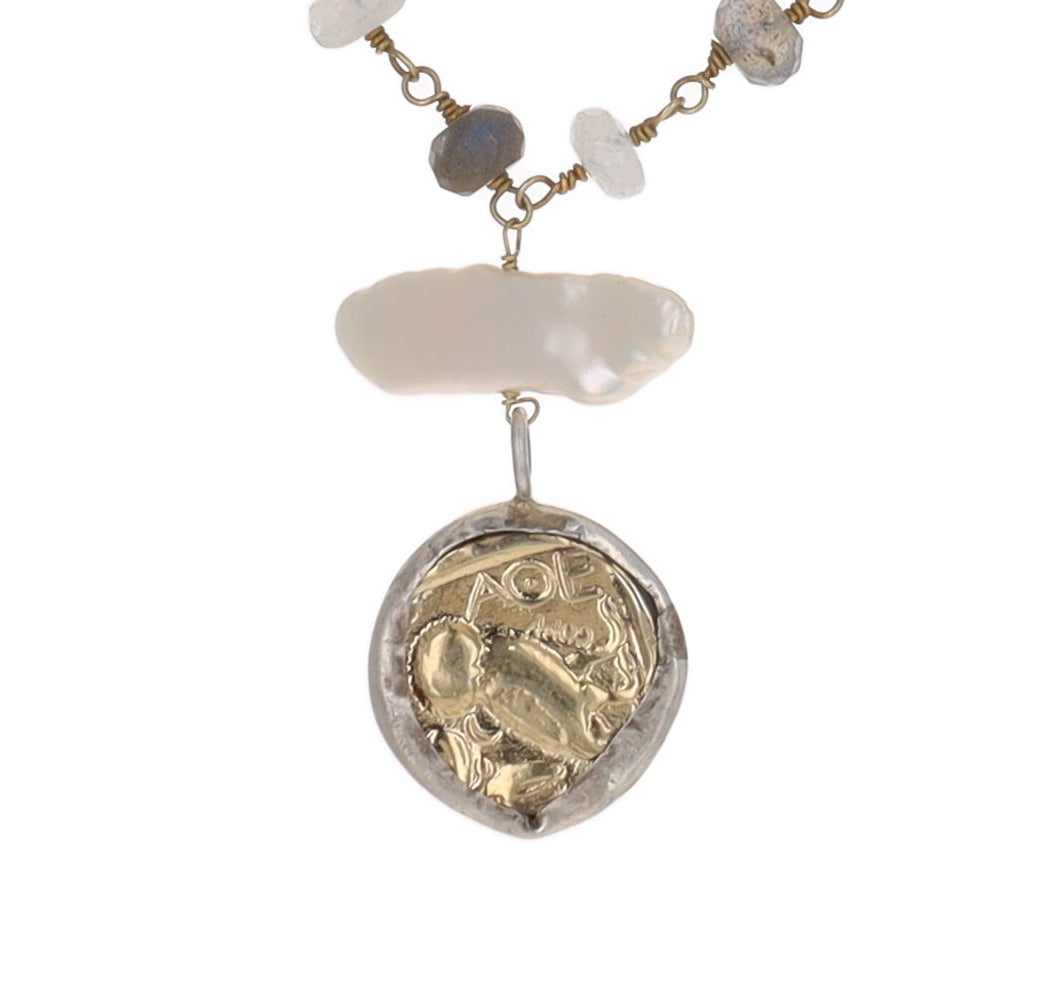 Necklace with pendant and beads on a white background