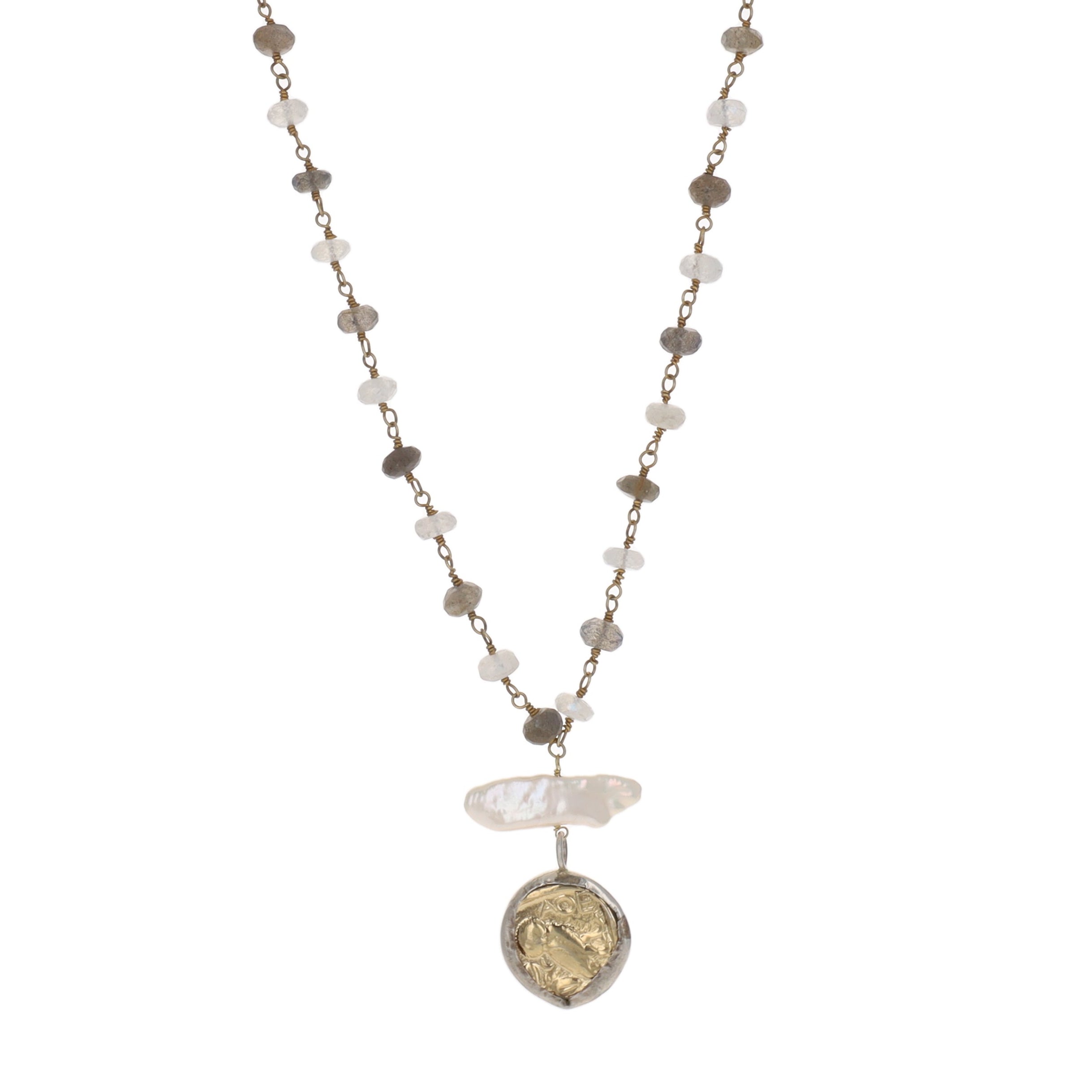 Necklace with beads and a pendant on a white background